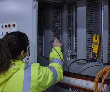 A member of the 14forty facilities management engineering team completing some electrical checks.